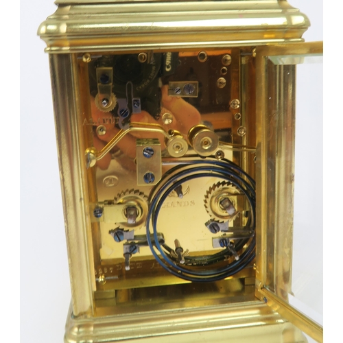 2204 - A FRENCH BRASS AND GLASS REPEATING CARRIAGE CLOCKby Drocourt for J. W. Benson, London with striking ... 