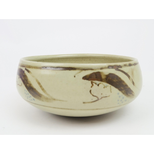 2209 - BERNARD LEACH (1887-1979)A stoneware pottery bowl, painted with scrolling decoration in brown, with ... 