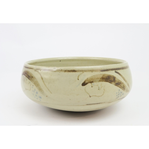 2209 - BERNARD LEACH (1887-1979)A stoneware pottery bowl, painted with scrolling decoration in brown, with ... 