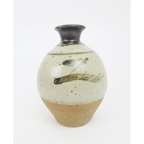 2210 - BERNARD LEACH (1887-1979)A stoneware pottery vase painted with stylised Z decoration, 9cm high, toge... 