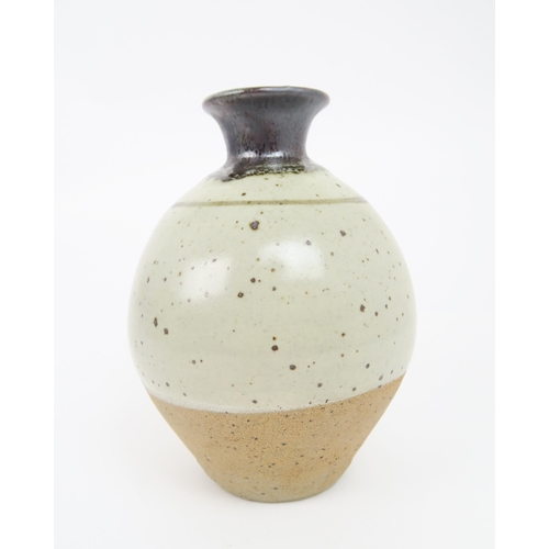 2210 - BERNARD LEACH (1887-1979)A stoneware pottery vase painted with stylised Z decoration, 9cm high, toge... 