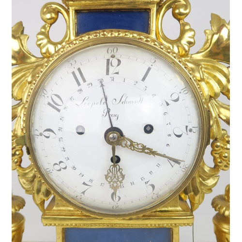 2211 - A LEOPOLD SCHMIDT PRAG GILTWOOD CHIMING MANTLE CLOCKthe circular white enamel face with concentric d... 