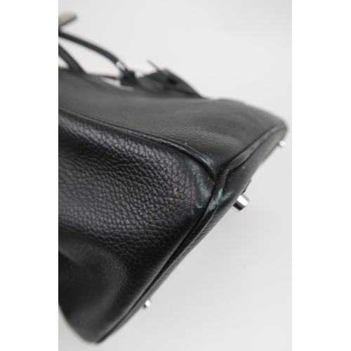 2212 - A HERMES 2010 BLACK BIRKIN 35 HANDBAGthe pebbled leather exterior with dual rolled handles, top flap... 