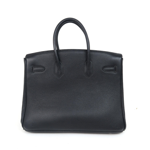 2212 - A HERMES 2010 BLACK BIRKIN 35 HANDBAGthe pebbled leather exterior with dual rolled handles, top flap... 