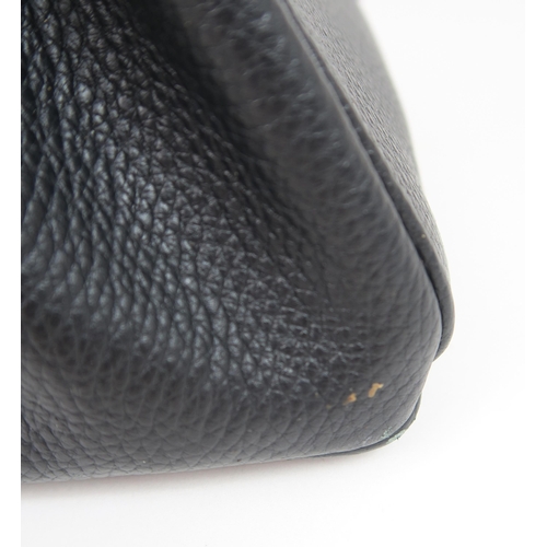 2212 - A HERMES 2010 BLACK BIRKIN 35 HANDBAGthe pebbled leather exterior with dual rolled handles, top flap... 