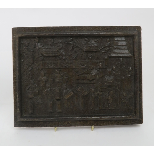 2357 - TWO CHINESE MOULDED TEA BLOCKSDecorated with figures processing tea, 18cm high, 23cm wide and 2.5cm ... 