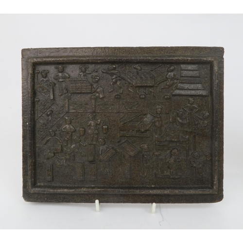 2357 - TWO CHINESE MOULDED TEA BLOCKSDecorated with figures processing tea, 18cm high, 23cm wide and 2.5cm ... 