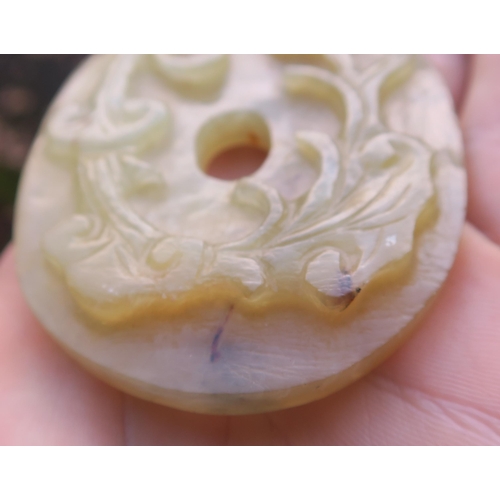 2361 - A CHINESE JADE BUTTON HOOKCarved with a chilong, 9.5cm long and three modern hardstone carved discs,... 