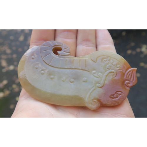 2361 - A CHINESE JADE BUTTON HOOKCarved with a chilong, 9.5cm long and three modern hardstone carved discs,... 