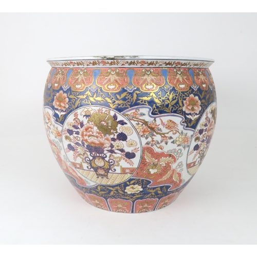 2368 - AN IMARI JARDINIERE Painted with panels of birds amongst flowers and foliage, late 20th century, 42c... 