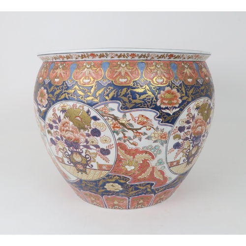 2368 - AN IMARI JARDINIERE Painted with panels of birds amongst flowers and foliage, late 20th century, 42c... 