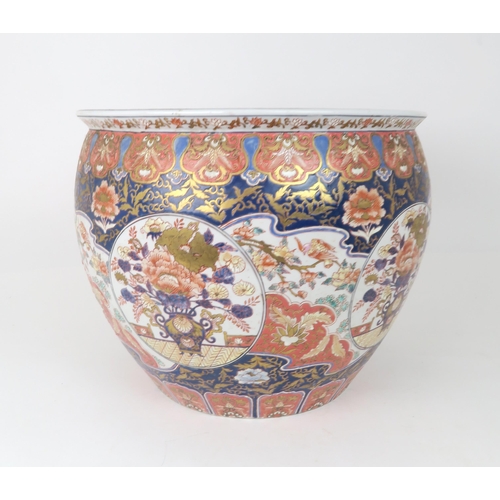 2368 - AN IMARI JARDINIERE Painted with panels of birds amongst flowers and foliage, late 20th century, 42c... 