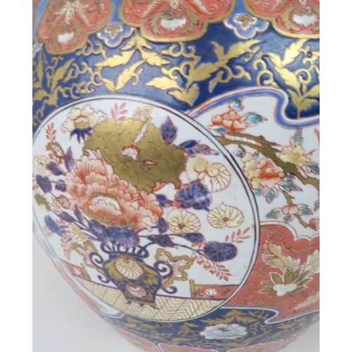 2368 - AN IMARI JARDINIERE Painted with panels of birds amongst flowers and foliage, late 20th century, 42c... 