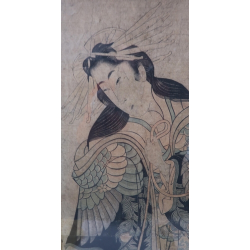 2370 - SHIGENOBU (1787-1832) An Oban tate-e woodblock print of a geisha, signed to the lower left, 36 x 24c... 