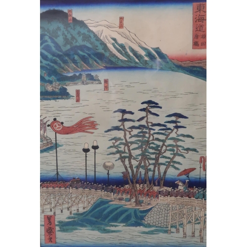 2370B - THE SCENIC PLACES OF THE TOKAIDO; a selection of ten tate-e woodblock prints including HIROSHIGE II ... 