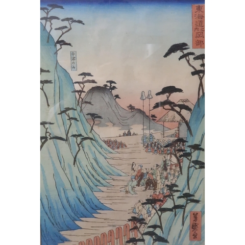 2370B - THE SCENIC PLACES OF THE TOKAIDO; a selection of ten tate-e woodblock prints including HIROSHIGE II ... 