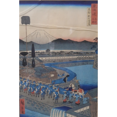 2370B - THE SCENIC PLACES OF THE TOKAIDO; a selection of ten tate-e woodblock prints including HIROSHIGE II ... 