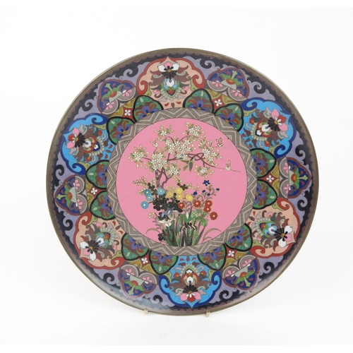 2372 - A CHINESE CLOISONNE CIRCULAR DISH Decorated with a central floral medallion, within stiff leaf panel... 