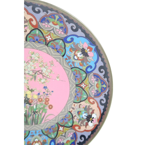 2372 - A CHINESE CLOISONNE CIRCULAR DISH Decorated with a central floral medallion, within stiff leaf panel... 