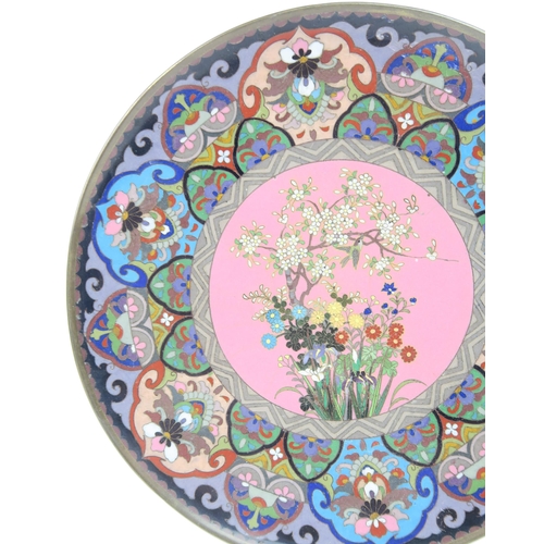 2372 - A CHINESE CLOISONNE CIRCULAR DISH Decorated with a central floral medallion, within stiff leaf panel... 