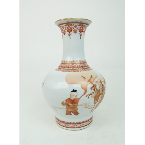 2376 - A CHINESE REPUBLIC IRON-RED VASE Painted and printed with Shou Lao and attendants, within trellis pa... 