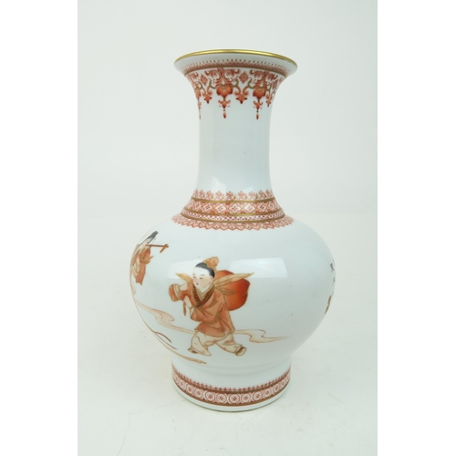 2376 - A CHINESE REPUBLIC IRON-RED VASE Painted and printed with Shou Lao and attendants, within trellis pa... 