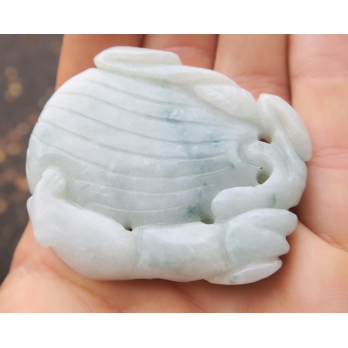 2378 - A CHINESE JADEITE PENDANT Carved with a feline on a fruit, 5cm high, Bi disc, 6.5cm wide and a ... 