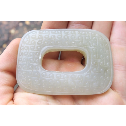 2378 - A CHINESE JADEITE PENDANT Carved with a feline on a fruit, 5cm high, Bi disc, 6.5cm wide and a ... 