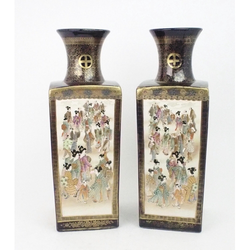 2394 - A PAIR OF SATSUMA SQUARE VASES Painted with panels of figures, landscapes and birds, divided by blue... 