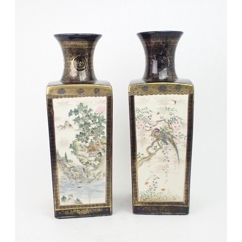 2394 - A PAIR OF SATSUMA SQUARE VASES Painted with panels of figures, landscapes and birds, divided by blue... 