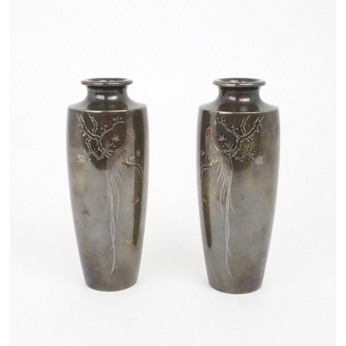 2396 - A PAIR OF JAPANESE BRONZE SLENDER VASES Decorated with a cockerel perched on a blossoming branch, si... 