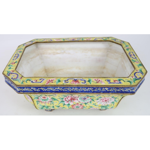 2401 - A CANTON ENAMEL YELLOW GROUND JARDINIERE Painted with peonies and scrolling foliage, beneath a blue ... 