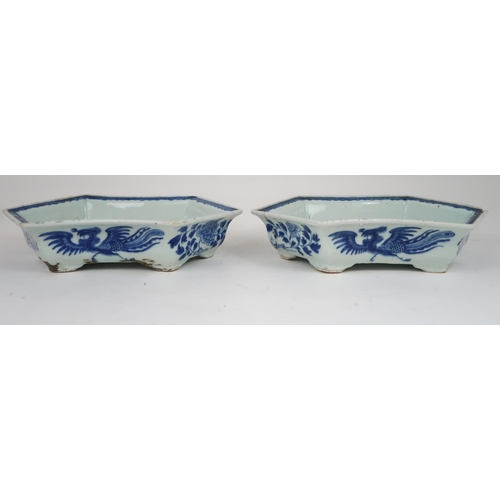 2403 - A PAIR OF CHINESE BLUE AND WHITE HEXAGONAL SHAPED DISHES Painted with phoenix and foliage and o... 