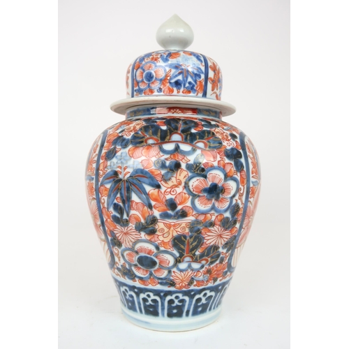 2404 - AN IMARI JAR AND COVER Painted with foliage, 32cm high, a Canton teapot, 12cm high and tray, 25... 