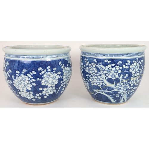 2405 - A LARGE CHINESE EXPORT BLUE AND WHITE DISH Painted with a willow tree, chrysanthemum, peonies a... 