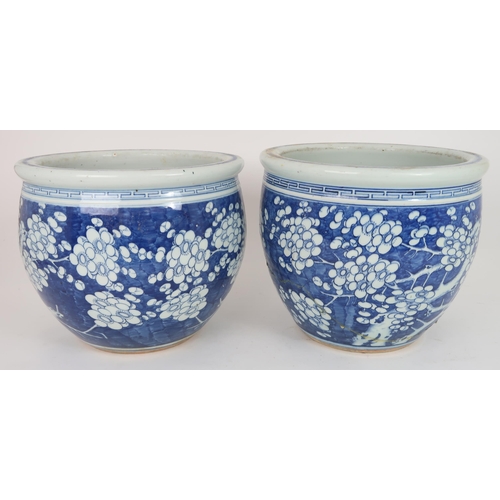 2405 - A LARGE CHINESE EXPORT BLUE AND WHITE DISH Painted with a willow tree, chrysanthemum, peonies a... 