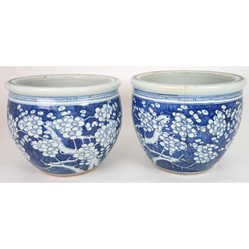 2405 - A LARGE CHINESE EXPORT BLUE AND WHITE DISH Painted with a willow tree, chrysanthemum, peonies a... 