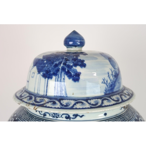 2408 - A CHINESE EXPORT BLUE AND WHITE TEA JAR AND A COVER Painted with figures approaching a bri... 