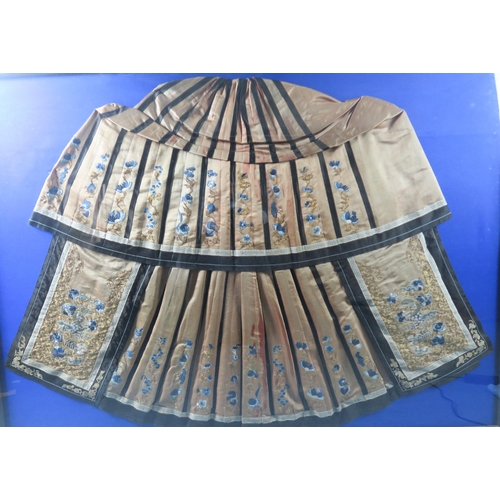 2412 - A CHINESE HAN STYLE PANEL SKIRT (MANG CHU) Embroidered with a wish for prosperity with coins an... 