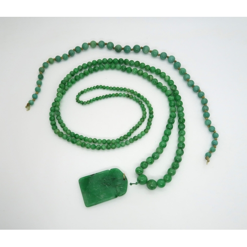 2414 - A CHINESE HARDSTONE BEAD NECKLACE With beads in various sizes, .2 to .5cm diameter,48cm long another... 