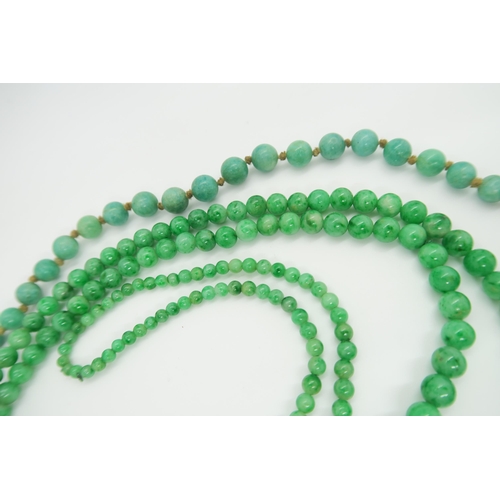 2414 - A CHINESE HARDSTONE BEAD NECKLACE With beads in various sizes, .2 to .5cm diameter,48cm long another... 