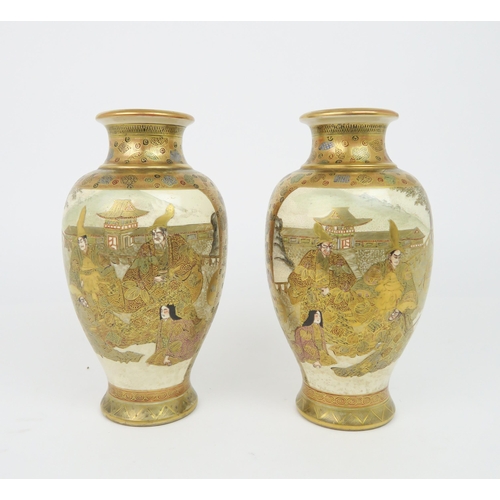 2416 - A PAIR OF SATSUMA BALUSTER VASES Decorated with Sennin, Samurai and attendants within gilt foli... 