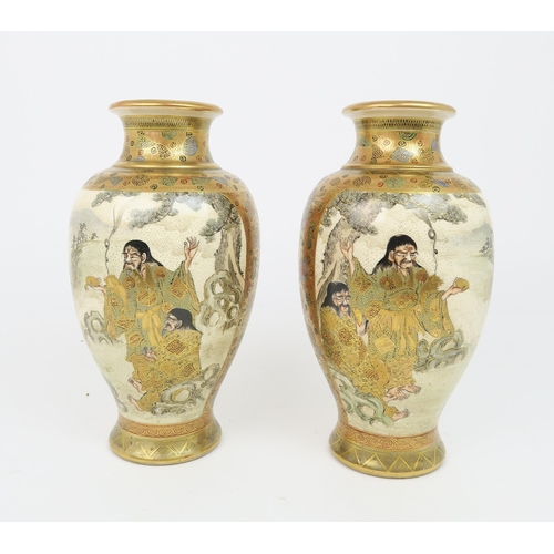 2416 - A PAIR OF SATSUMA BALUSTER VASES Decorated with Sennin, Samurai and attendants within gilt foli... 