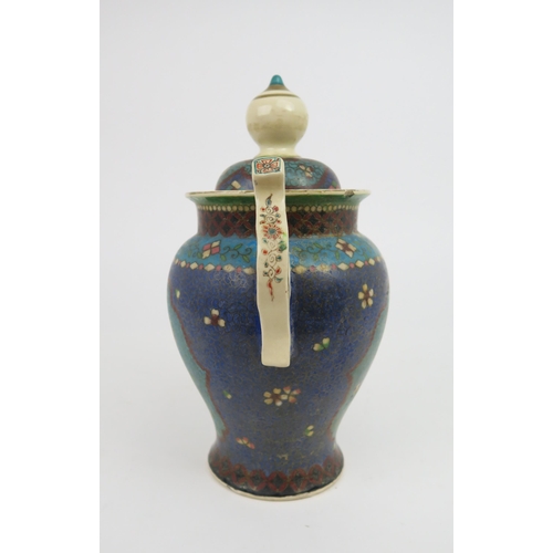 2418 - AN ASIAN POTTERY AND CLOISONNE TWO HANDLED VASE AND COVER Decorated with ogival shaped panels o... 