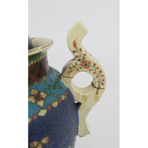 2418 - AN ASIAN POTTERY AND CLOISONNE TWO HANDLED VASE AND COVER Decorated with ogival shaped panels o... 