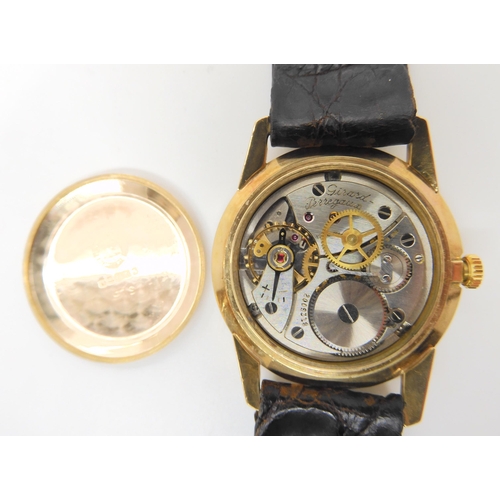 2885 - A 9CT GOLD GIRARD PEREGAUX WATCHwith cream dial, gold baton numerals and hands. Diameter of the case... 