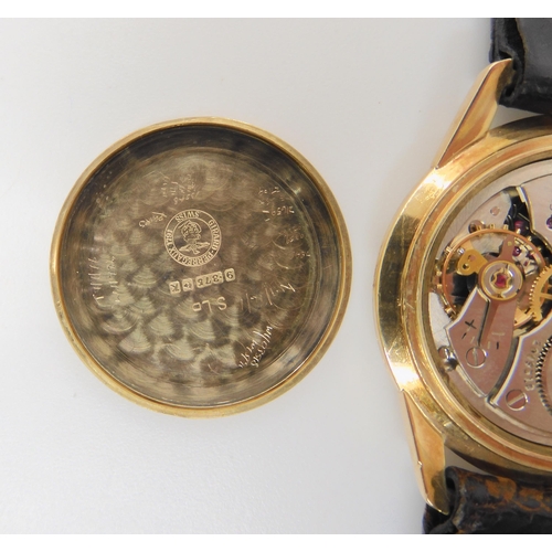 2885 - A 9CT GOLD GIRARD PEREGAUX WATCHwith cream dial, gold baton numerals and hands. Diameter of the case... 