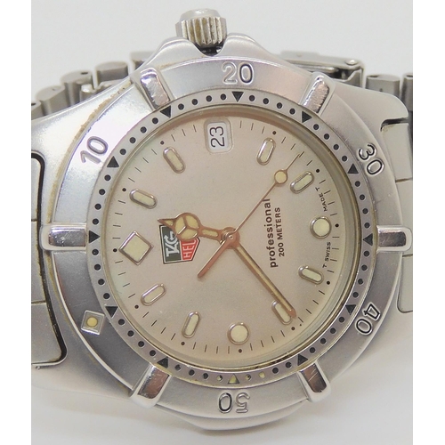 2888A - A TAG HEUER PROFESSIONALwith silvered dial, baton and dot luminous numerals and hands, with date ape... 