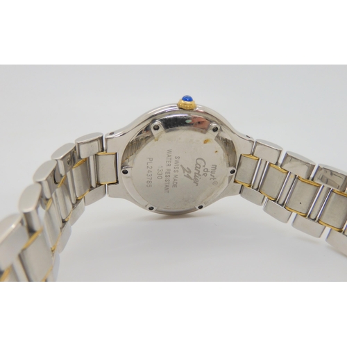 2894 - *WITHDRAWN* A MUST DE CARTIER 21 WATCHwith two tone dial and blued steel hands, jewel set winder and... 