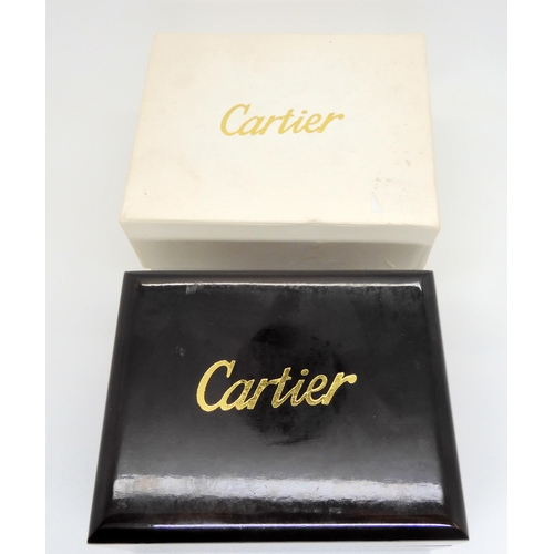 2894 - *WITHDRAWN* A MUST DE CARTIER 21 WATCHwith two tone dial and blued steel hands, jewel set winder and... 